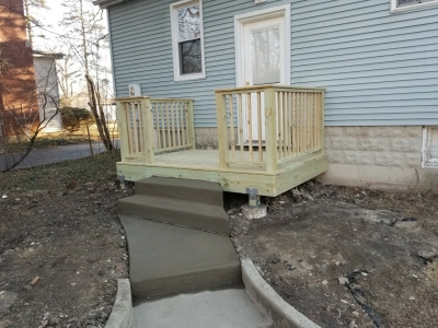 Deck and concrete walkway - 1